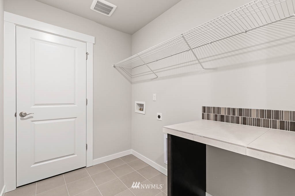 6 180th Place Southeast, Unit 34 Bothell, WA 98012 - Photo 26 of 36 a utility room with dryer and washer