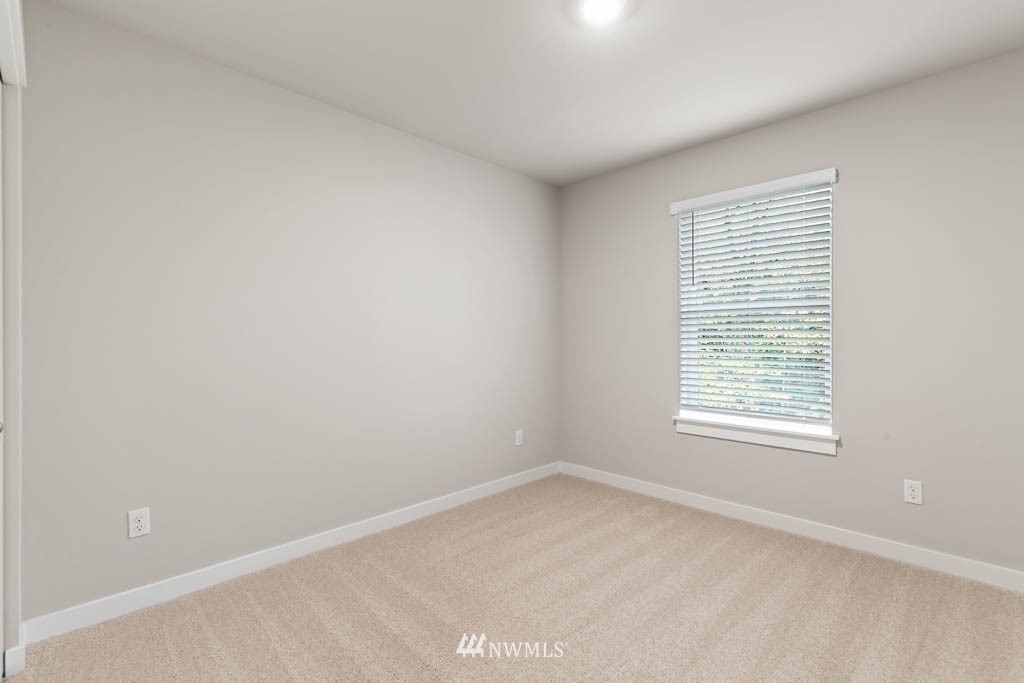 6 180th Place Southeast, Unit 34 Bothell, WA 98012 - Photo 27 of 36 an empty room with a window
