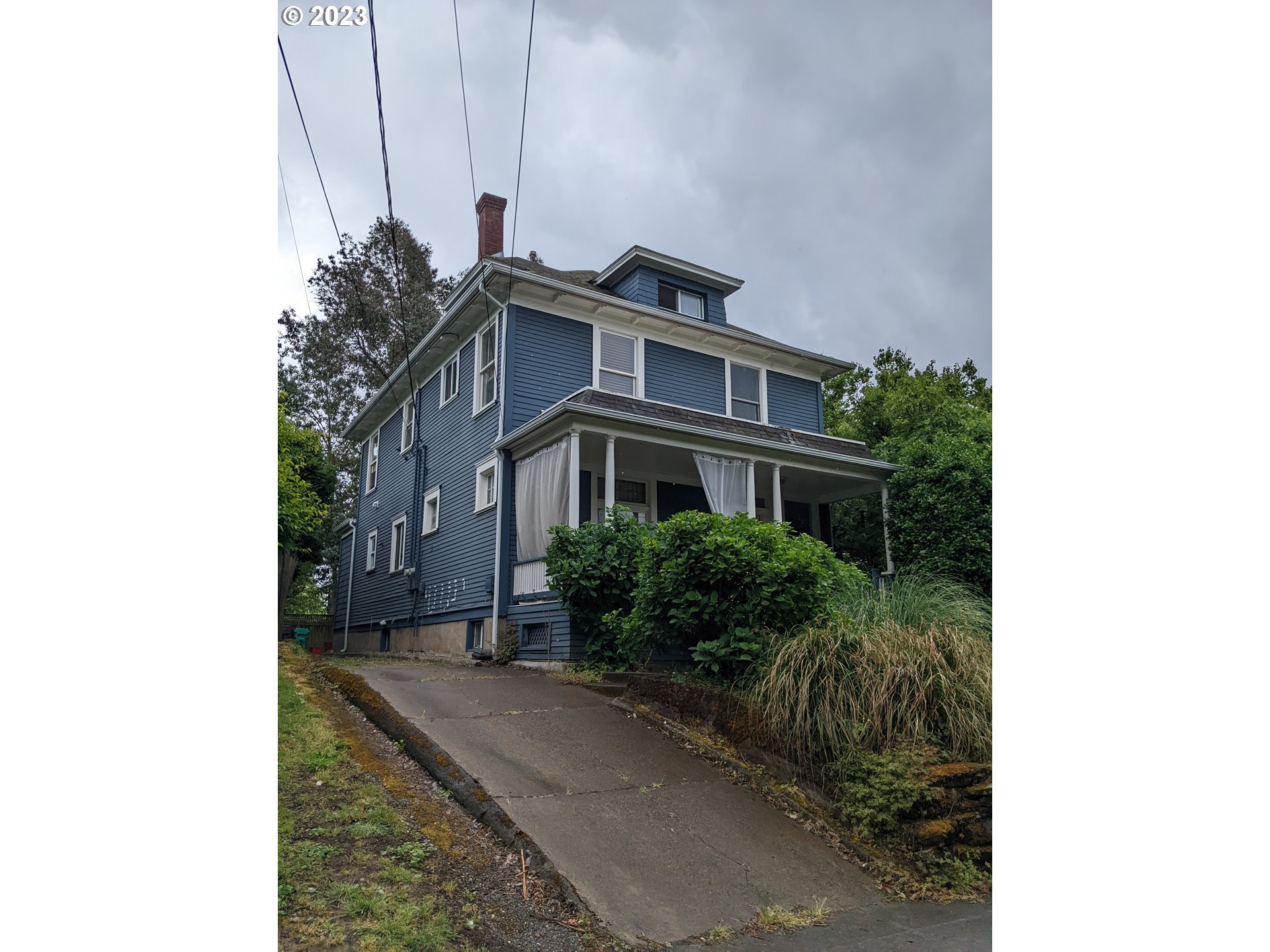 1414 Southeast Taylor Street Portland, OR 97214 - Photo 1 of 1 a front view of a house