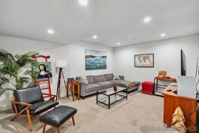 a living room with furniture and a couch