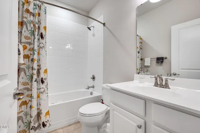 a bathroom with a sink a toilet and a bathtub