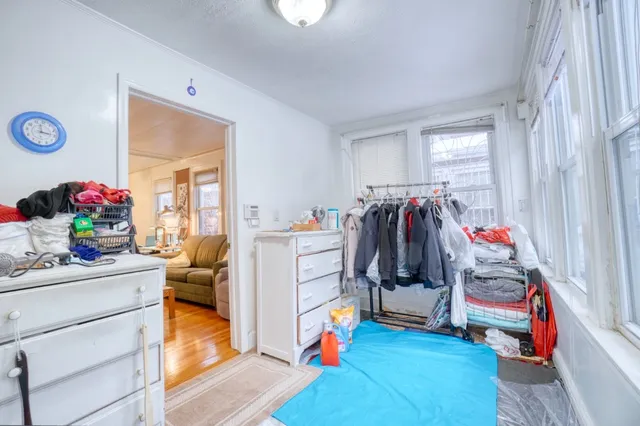 a room with furniture and gym equipment