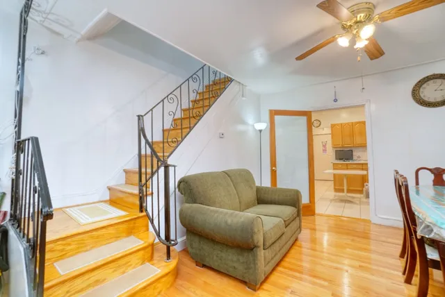 a living room with furniture and a table