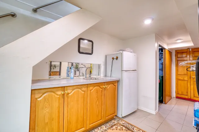 a view of a kitchen from the hallway