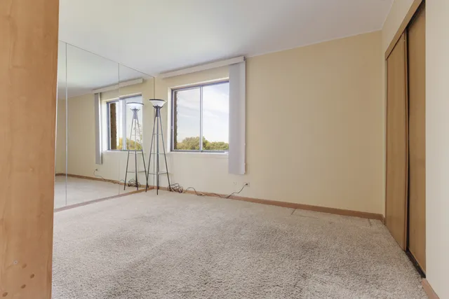 an empty room with windows