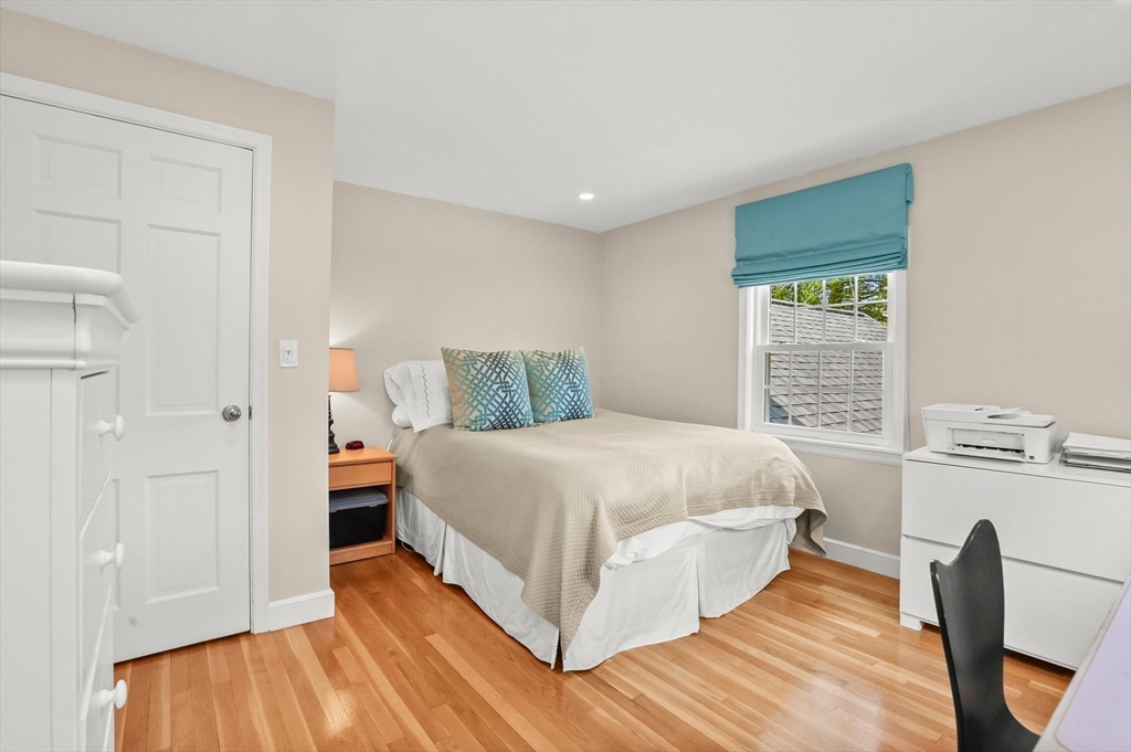109 Suffolk Road Wellesley, MA 02481 - Photo 17 of 24 a bedroom with a bed and a window
