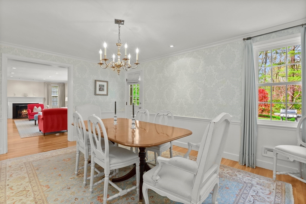 109 Suffolk Road Wellesley, MA 02481 - Photo 8 of 24 a view of a dining room with furniture and chandelier