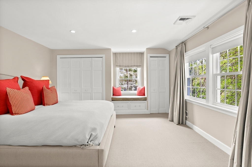 109 Suffolk Road Wellesley, MA 02481 - Photo 10 of 24 a bedroom with a large bed and a window
