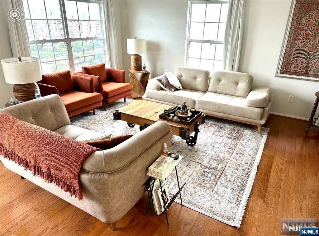 34 Bergen Ridge Road, Unit 2 North Bergen, NJ 07047 - Photo 10 of 41 a living room with furniture and a large window