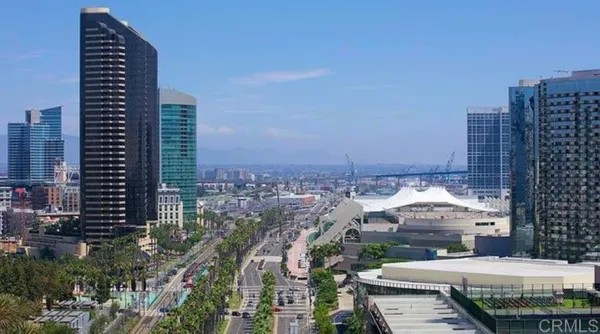 a view of a city with tall buildings