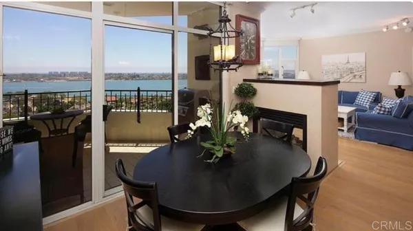 a dining room with furniture and a fireplace