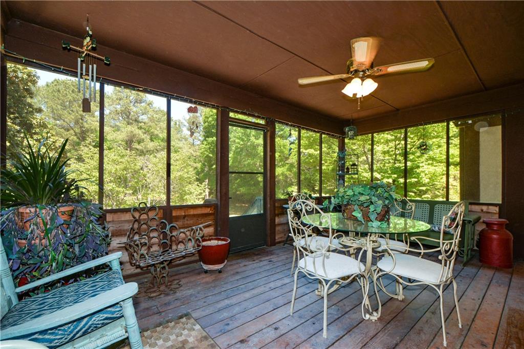 130 Hawn Road Fayetteville, GA 30215 - Photo 36 of 67 a view of a dining room with furniture window and wooden floor