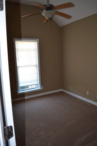 485 Bob White Road Macon, GA 31216 - Photo 5 of 13 an empty room with a window