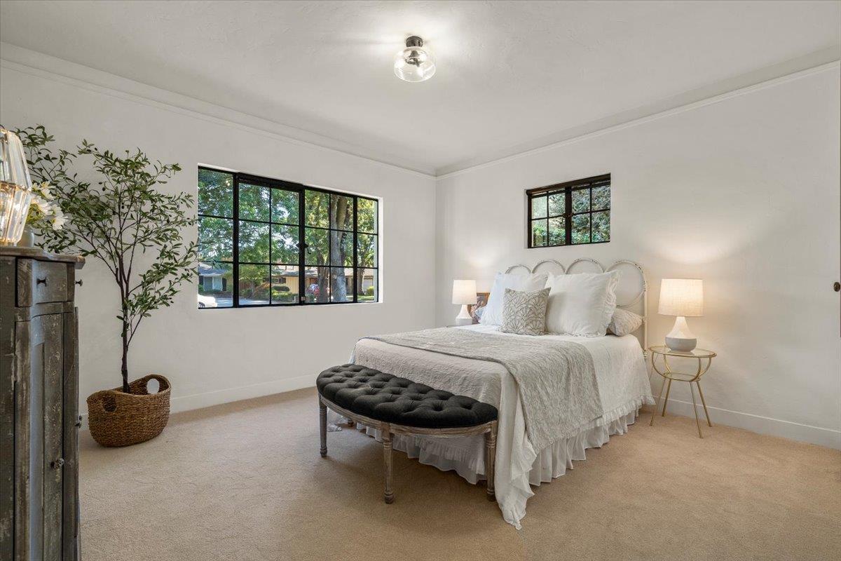 731 5th Street Gilroy, CA 95020 - Photo 20 of 31 a bed room with a bed and a couch