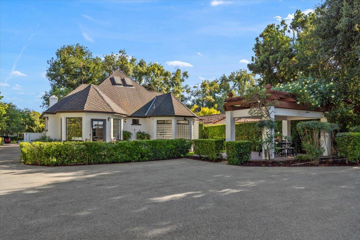 731 5th Street Gilroy, CA 95020 - Photo 27 of 31 a front view of a house with a garden