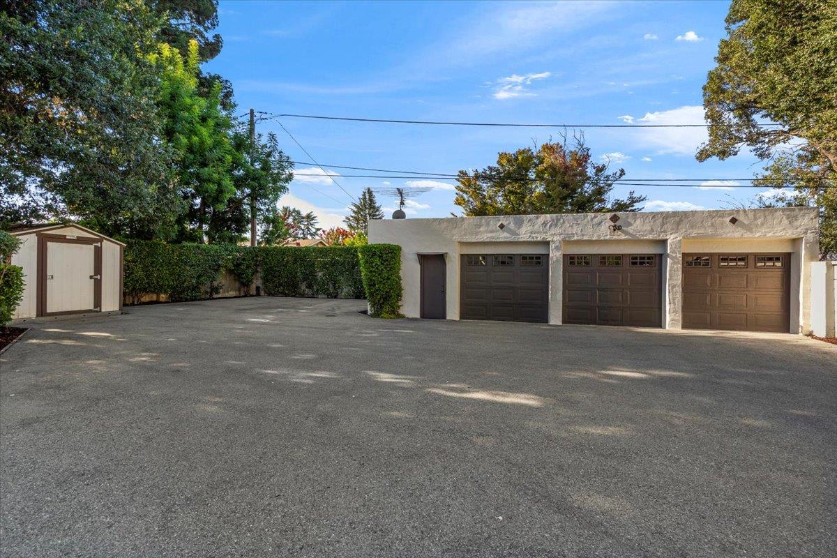 731 5th Street Gilroy, CA 95020 - Photo 30 of 31 a front view of a house with a yard and a garage