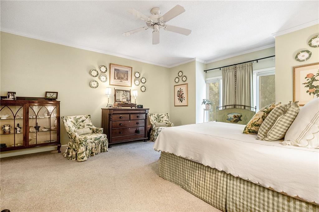 2769 Peachtree Road Northeast, Unit 6 Atlanta, GA 30305 - Photo 16 of 25 a bedroom with bed and window