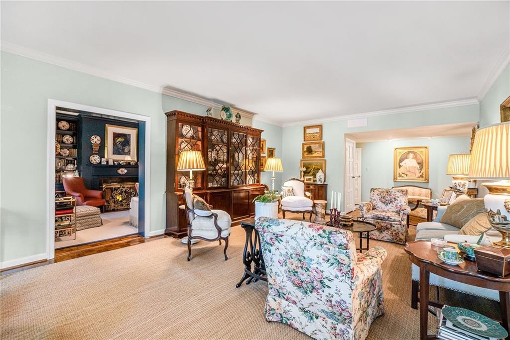 2769 Peachtree Road Northeast, Unit 6 Atlanta, GA 30305 - Photo 3 of 25 a living room with furniture and a flat screen tv