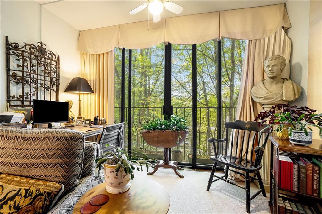2769 Peachtree Road Northeast, Unit 6 Atlanta, GA 30305 - Photo 7 of 25 a view of a livingroom with furniture water view