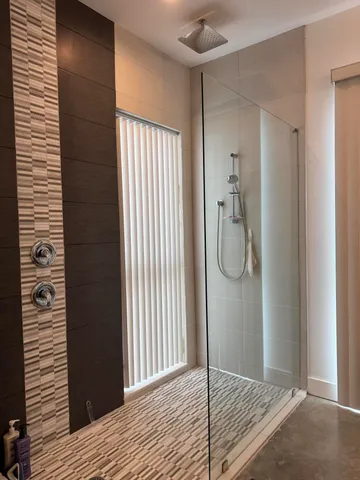 a view of a bathroom with a shower