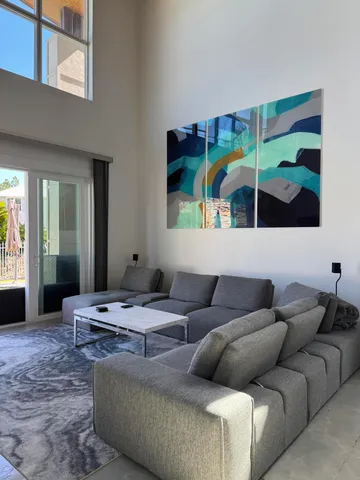 a living room with furniture and a couch