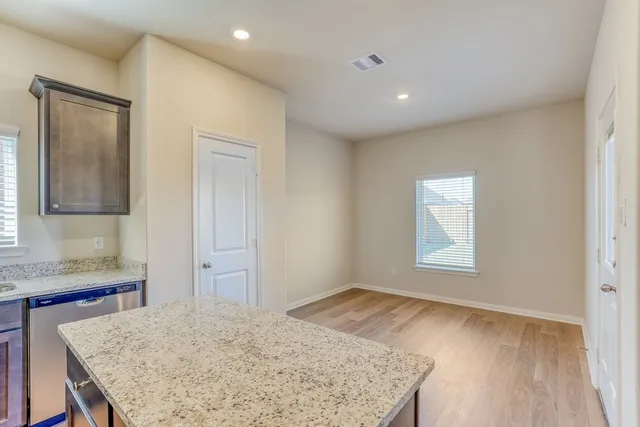 a view of kitchen and utility room