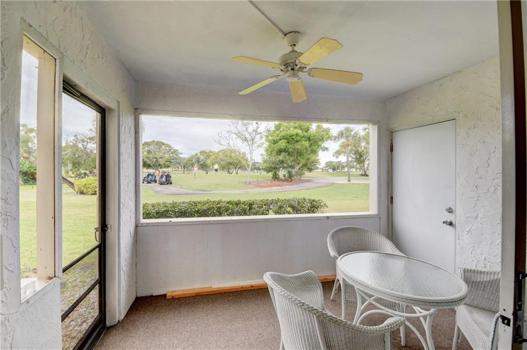 5111 Southeast Miles Grant Road, Unit 104 Stuart, FL 34997 - Photo 24 of 36 a view of a dining room with furniture window and outside view