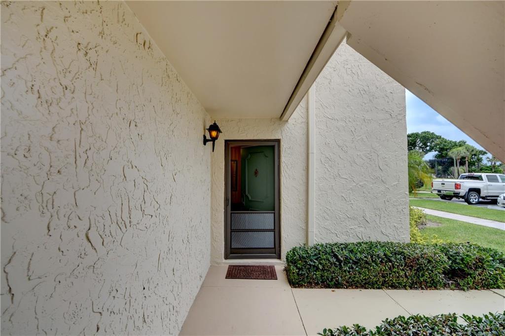 5111 Southeast Miles Grant Road, Unit 104 Stuart, FL 34997 - Photo 4 of 36 a view of a garage
