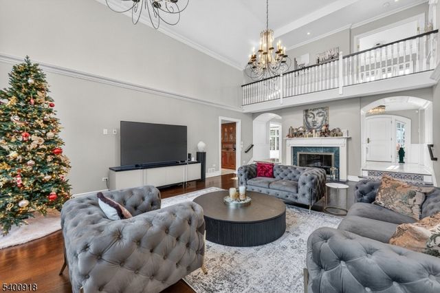 a kitchen with a stove a refrigerator and a dining table