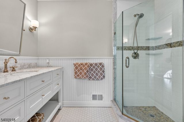 a living room with furniture gym equipment and a fireplace