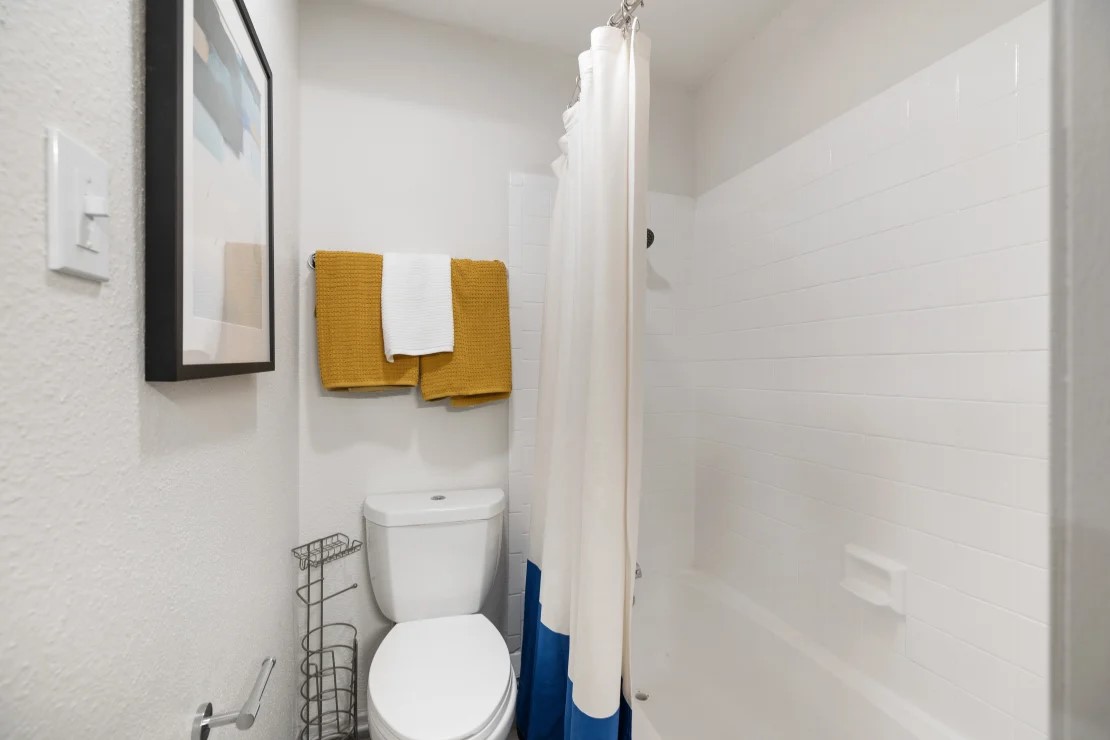 2800 South Ashford Road, Unit 2206 Houston, TX 77082 - Photo 12 of 35 a bathroom with a toilet and a sink