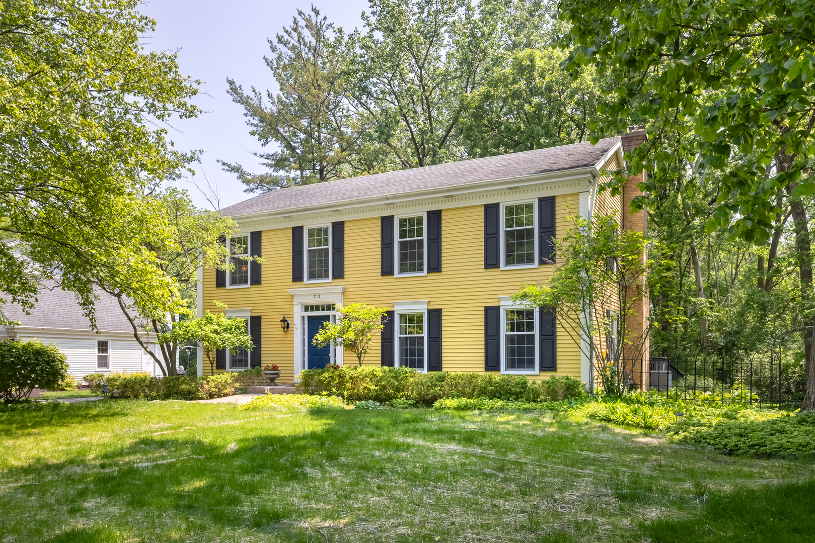715 Smoke Tree Road Deerfield, IL 60015 - Photo 1 of 41 a front view of a house with a yard