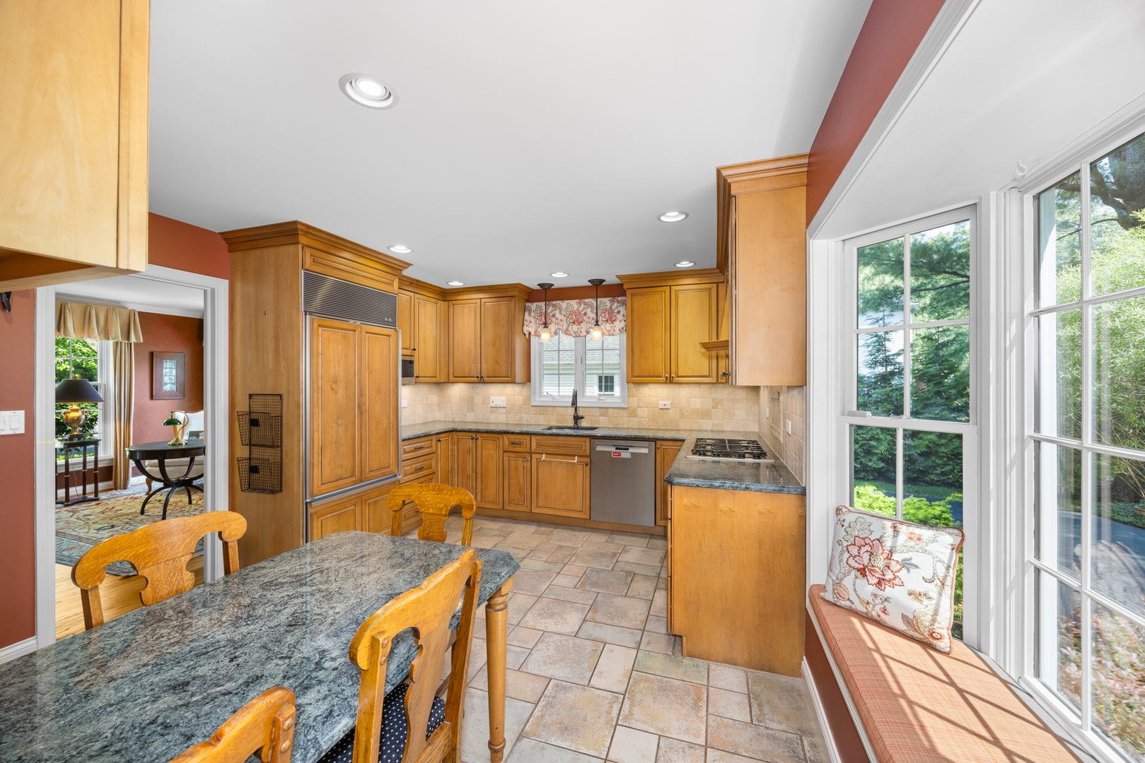 715 Smoke Tree Road Deerfield, IL 60015 - Photo 16 of 41 a kitchen with stainless steel appliances granite countertop sink stove and refrigerator