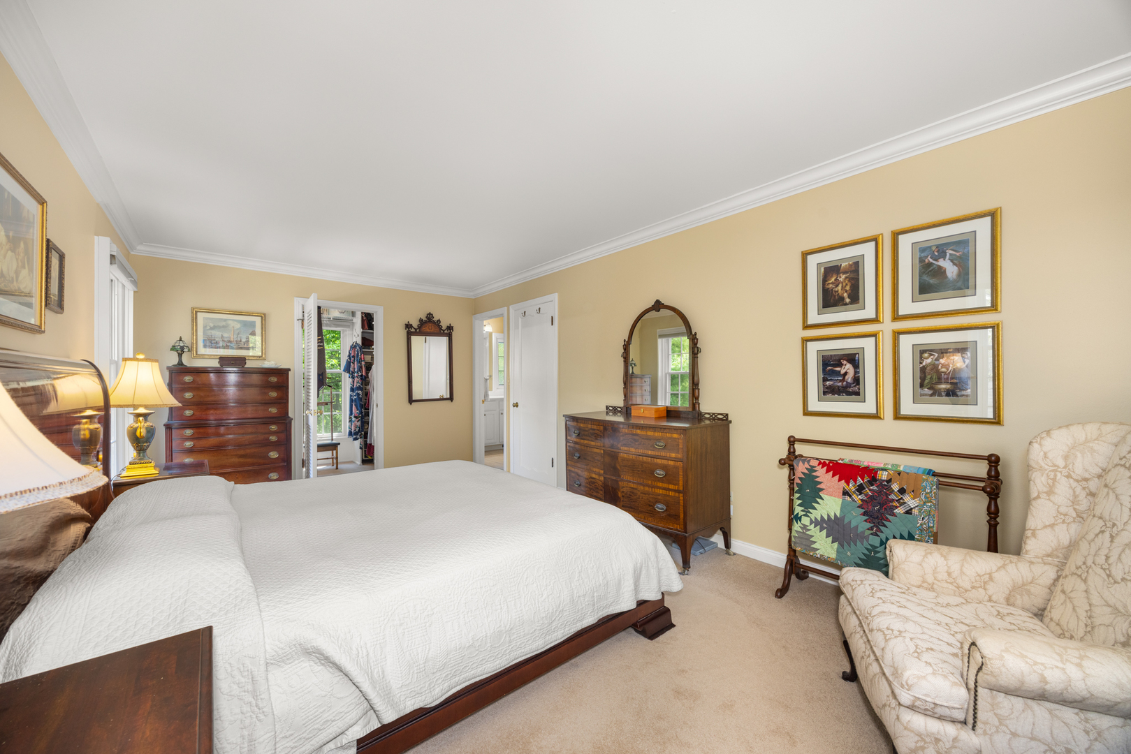 715 Smoke Tree Road Deerfield, IL 60015 - Photo 19 of 41 a bedroom with a bed and a flat screen tv