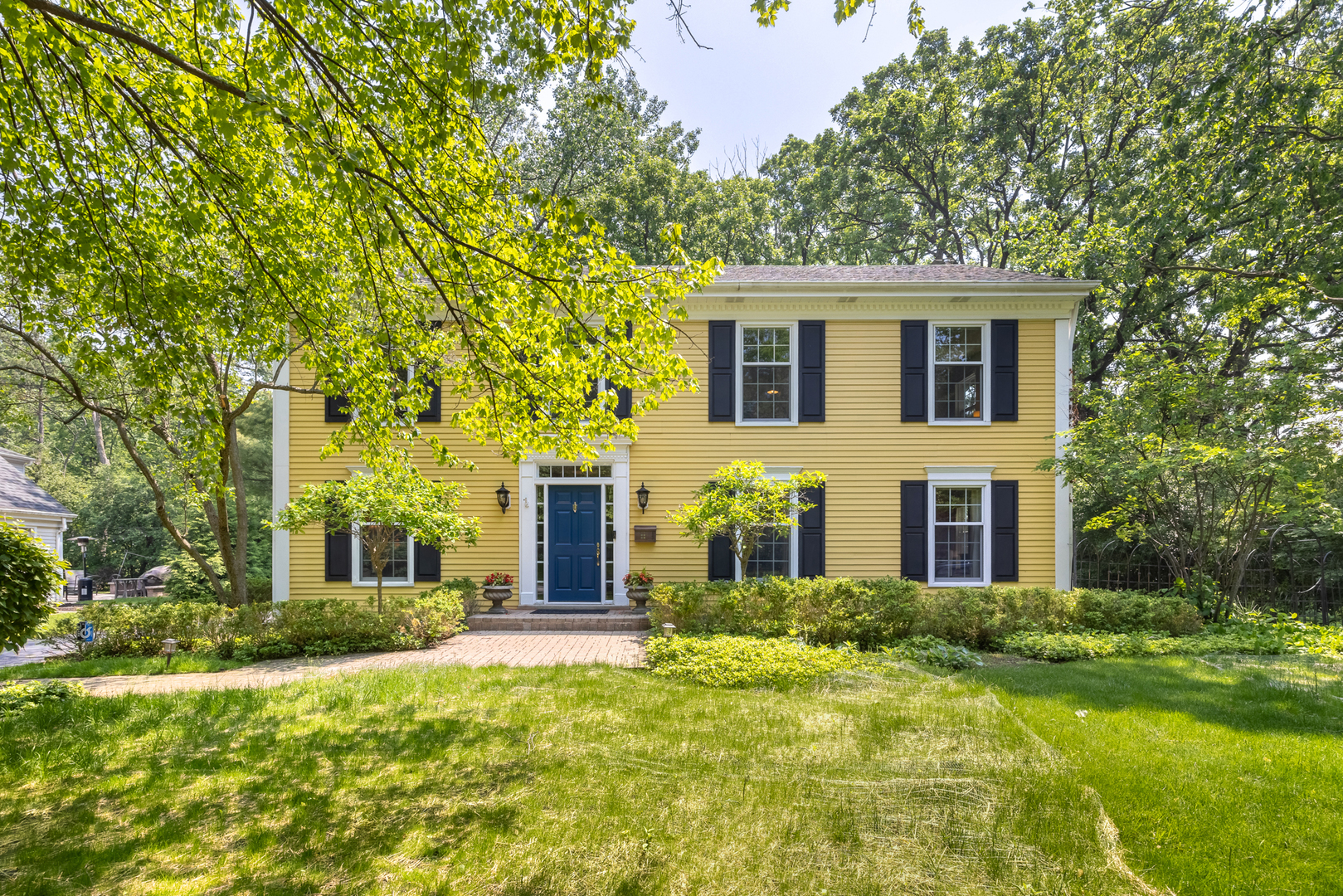 715 Smoke Tree Road Deerfield, IL 60015 - Photo 2 of 41 a front view of a house with a yard