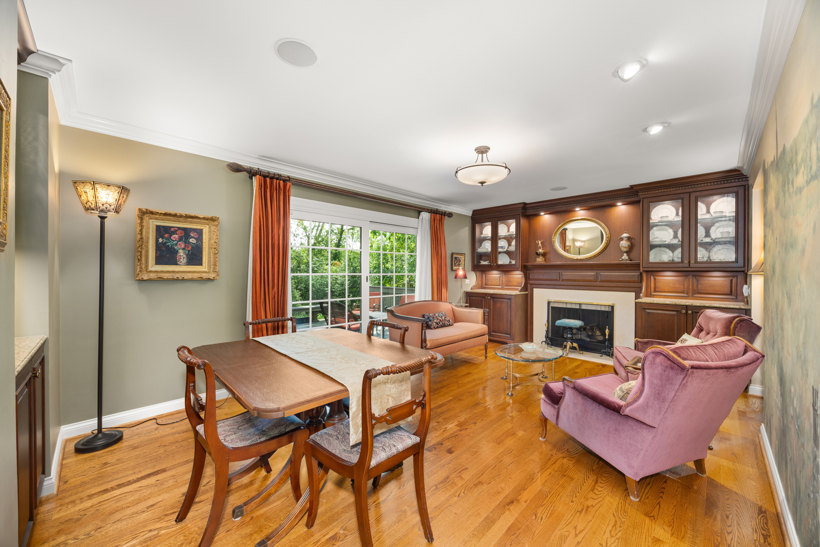 715 Smoke Tree Road Deerfield, IL 60015 - Photo 7 of 41 a living room with furniture a fireplace and a large window
