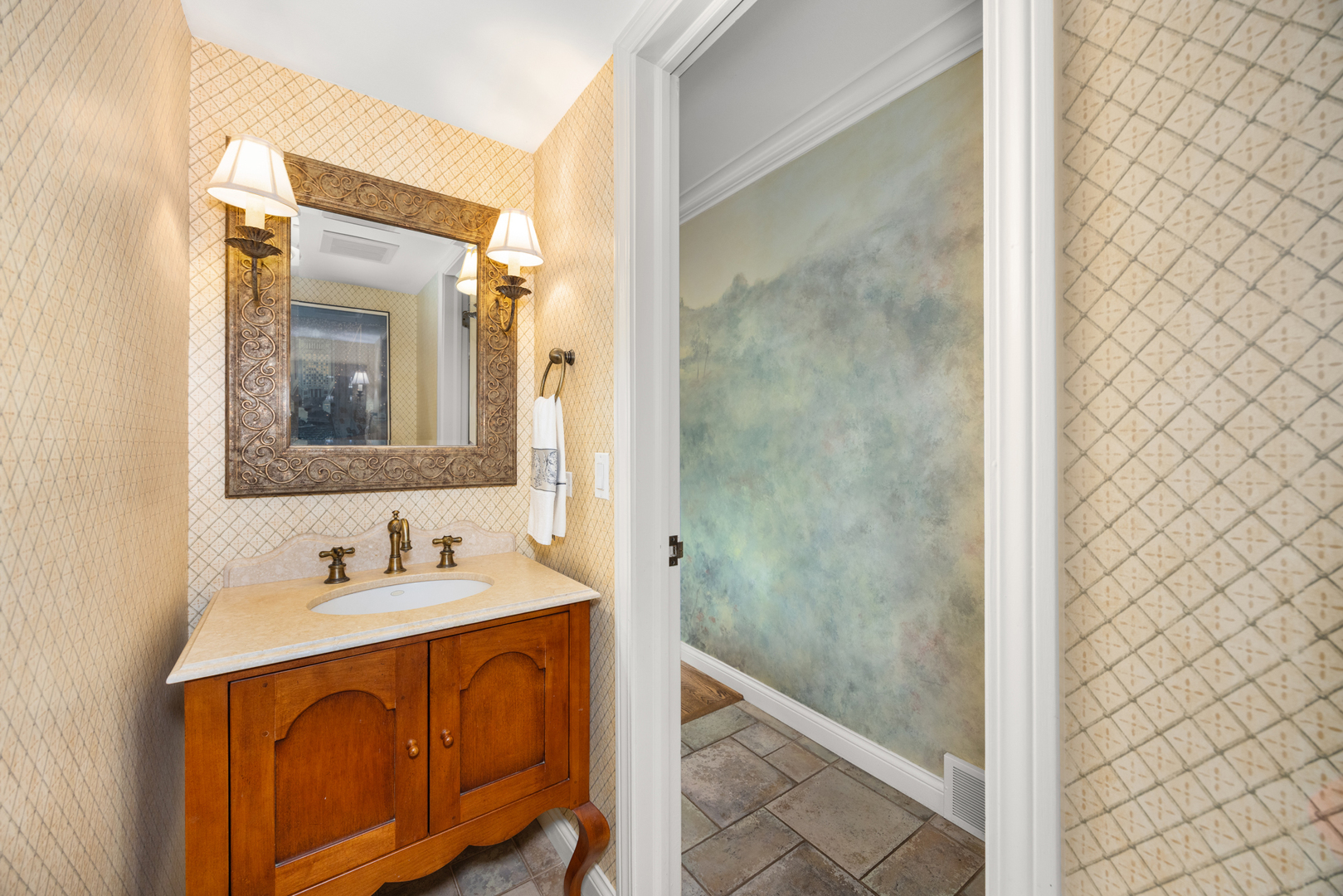 715 Smoke Tree Road Deerfield, IL 60015 - Photo 10 of 41 a bathroom with a sink a mirror and a shower