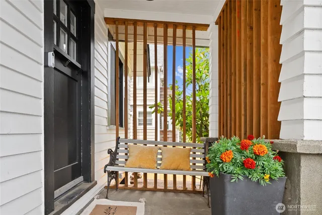 a view of balcony with furniture