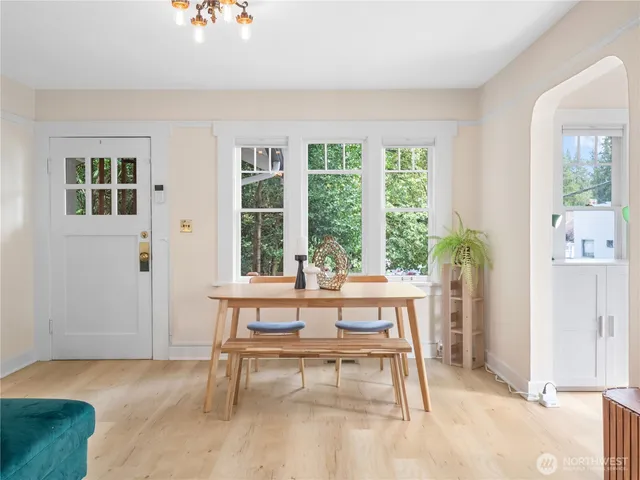 a living room with furniture and a table