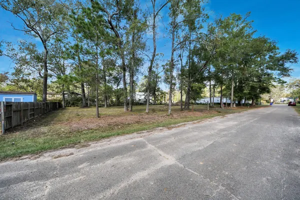 a view of road with trees