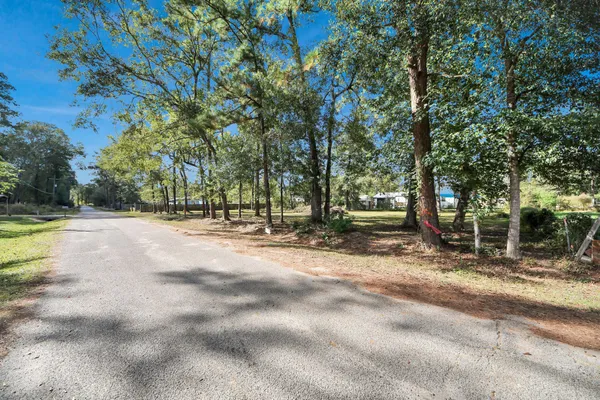 a view of road with trees