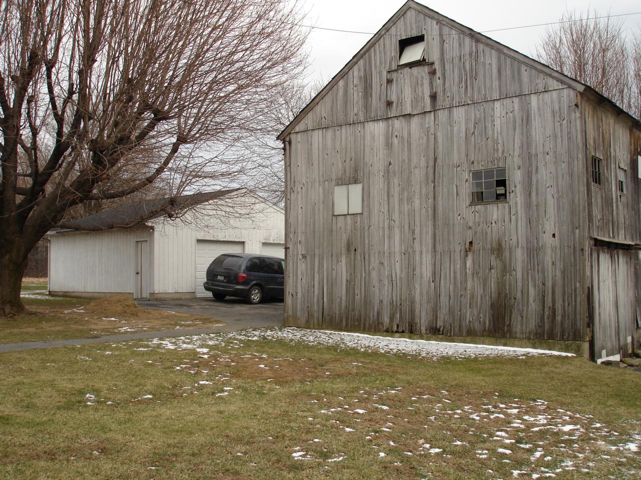1256 Bushkill Center Road Wind Gap, PA 18091 - Photo 3 of 4 a view of a house with backyard and parking area