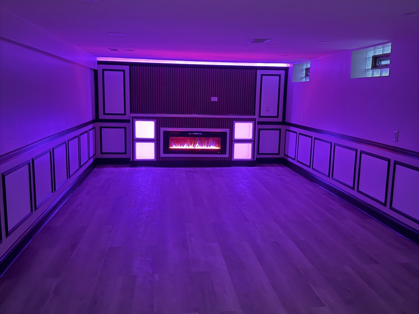 1650 Cedar Road Homewood, IL 60430 - Photo 2 of 38 a view of wooden floor in a hall with a fireplace