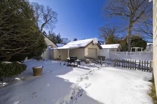 a view of house with outdoor seating area