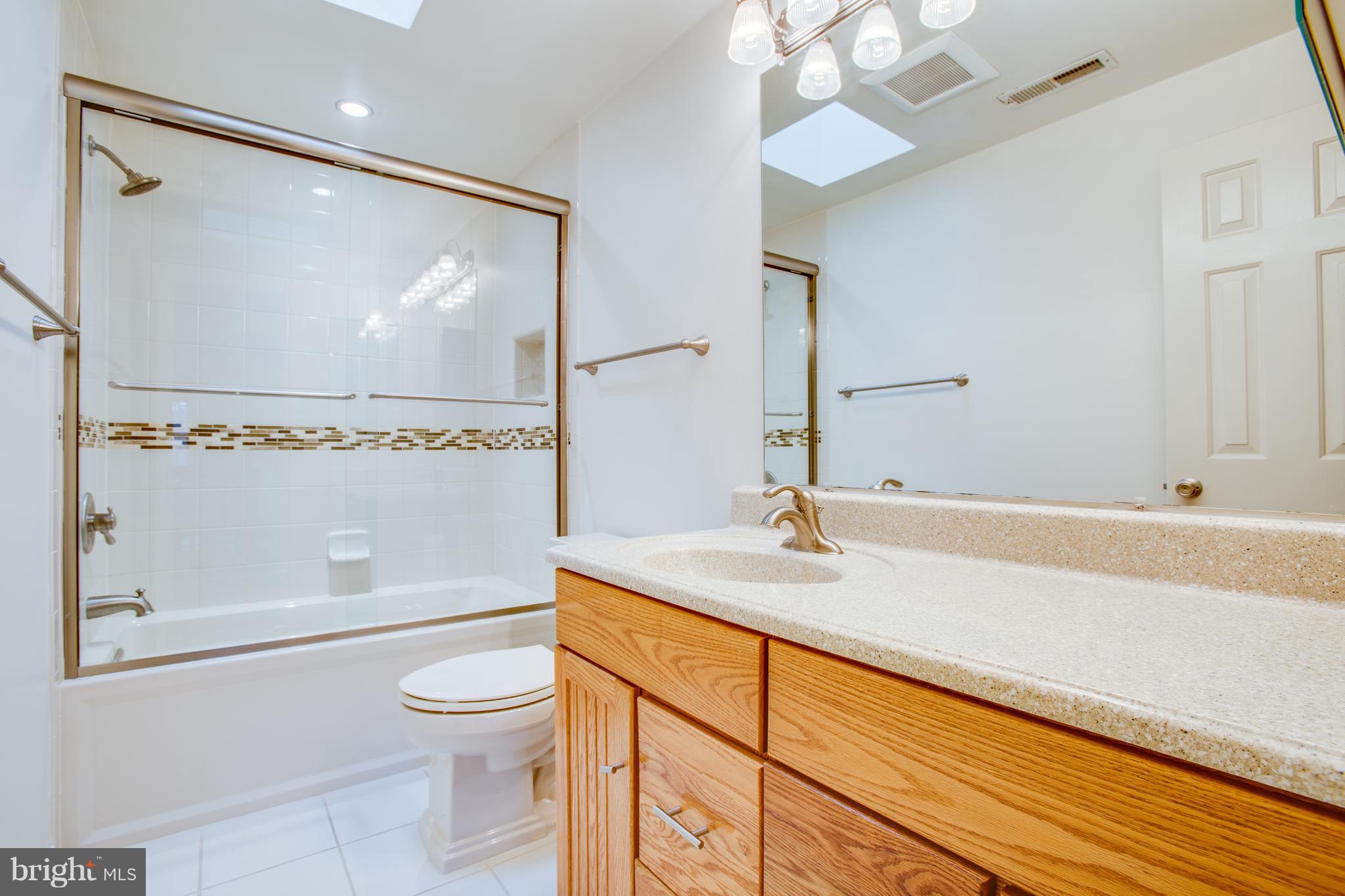 7221 Peppermill Road King George, VA 22485 - Photo 28 of 30 Hall Bath w/Skylight and Tiled Shower