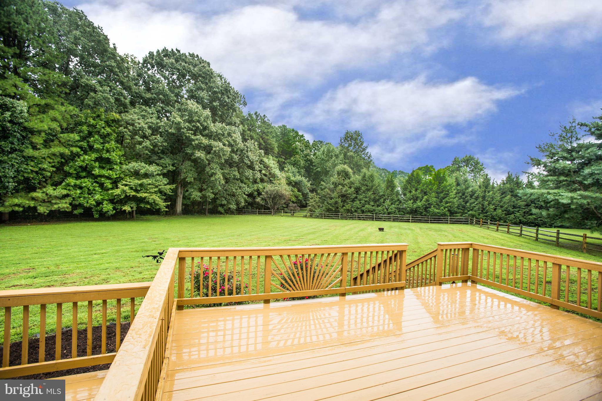 7221 Peppermill Road King George, VA 22485 - Photo 6 of 30 Large Deck looking out to the fenced-in backyard.