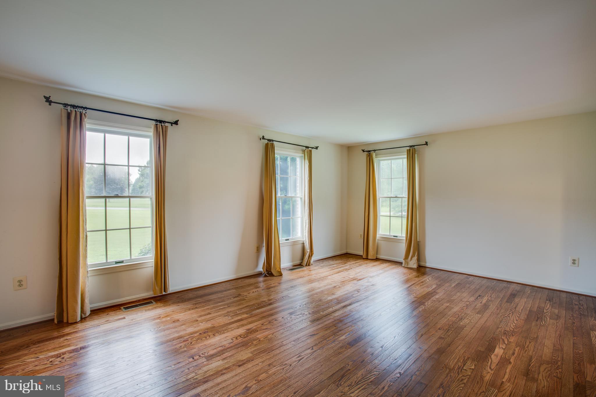 7221 Peppermill Road King George, VA 22485 - Photo 10 of 30 Family Room with refinished hardwood floors.