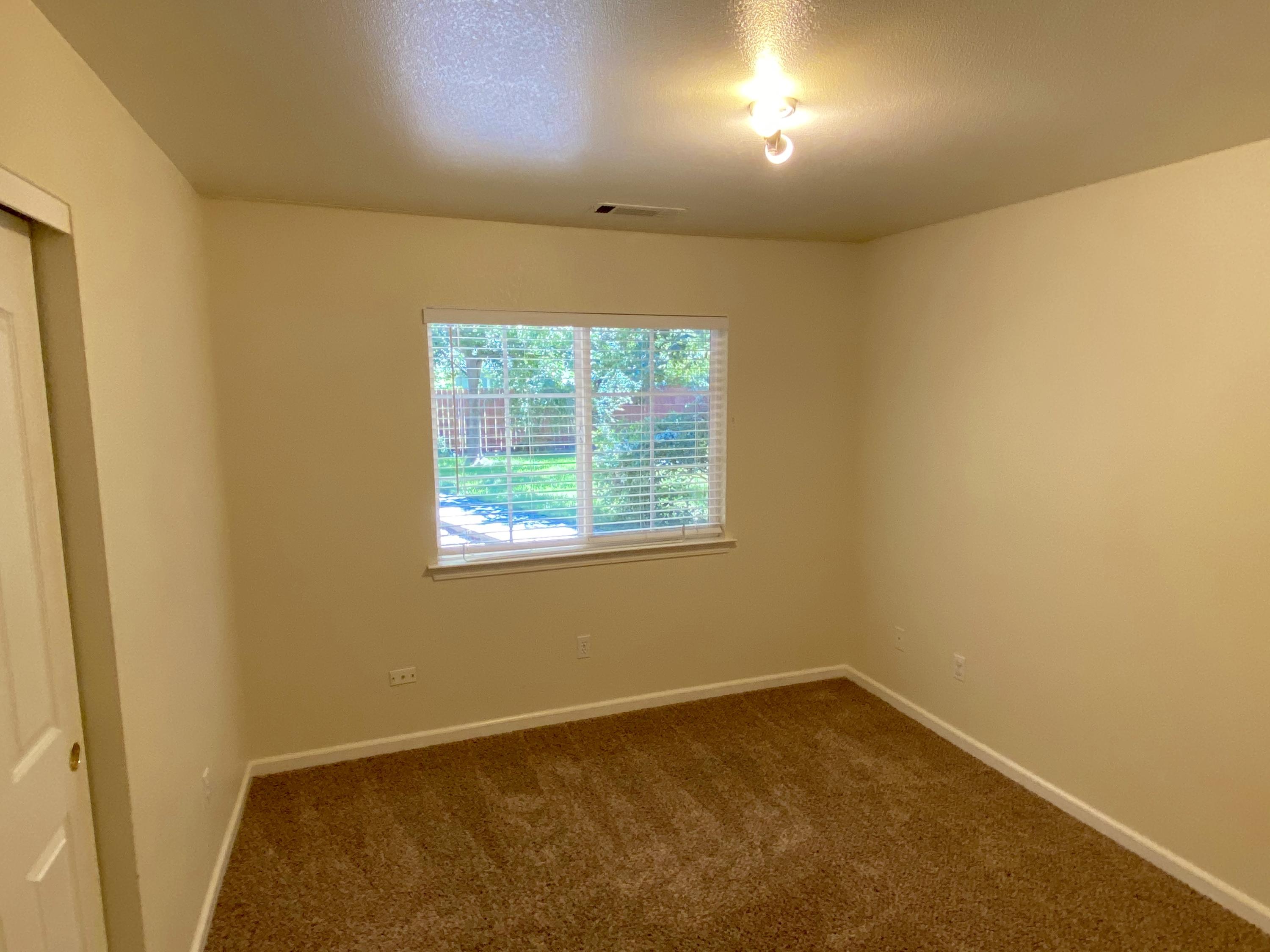 5378 Cedars Road Redding, CA 96001 - Photo 11 of 23 an empty room with a window