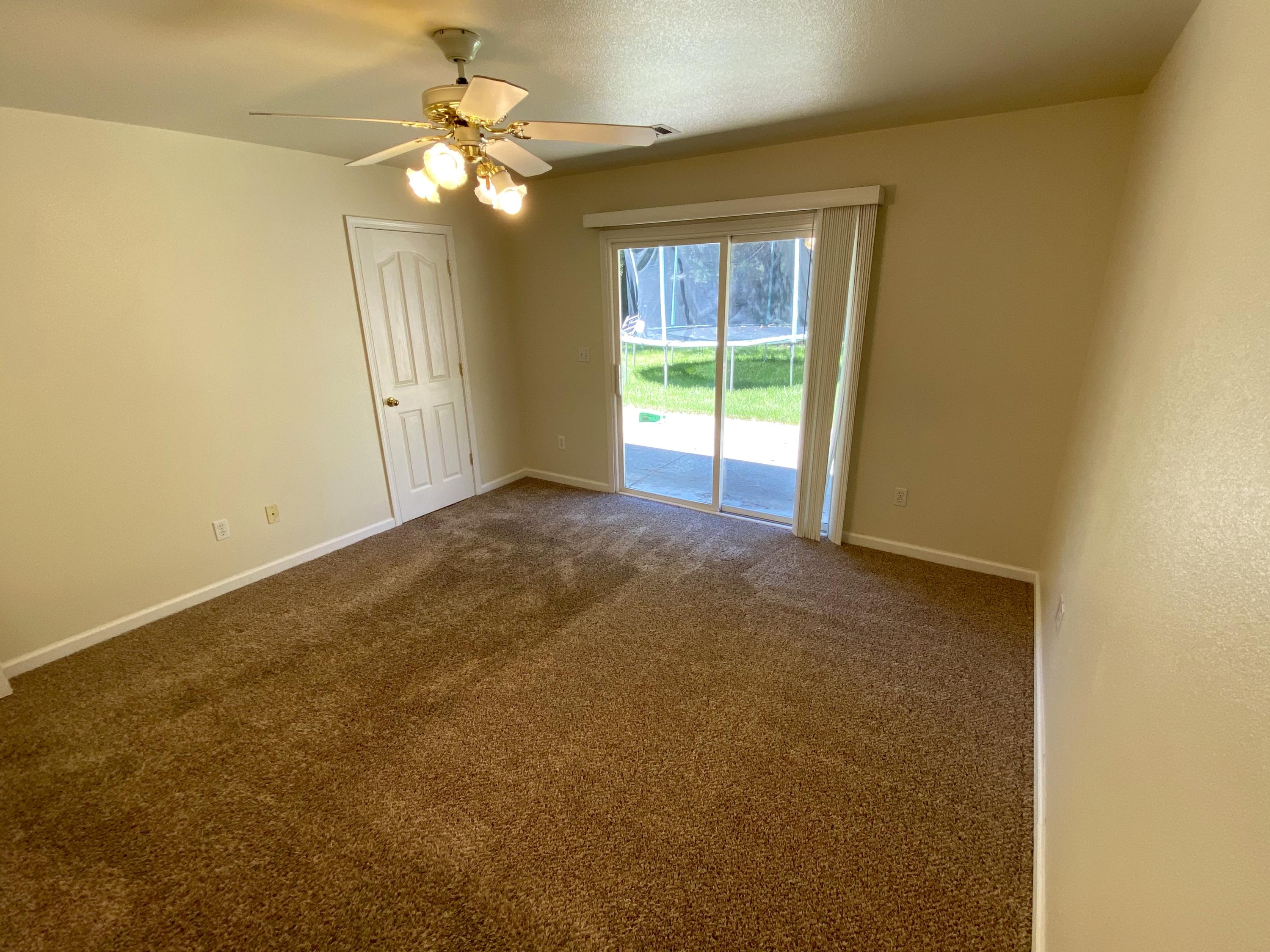 5378 Cedars Road Redding, CA 96001 - Photo 14 of 23 a view of an empty room with a window