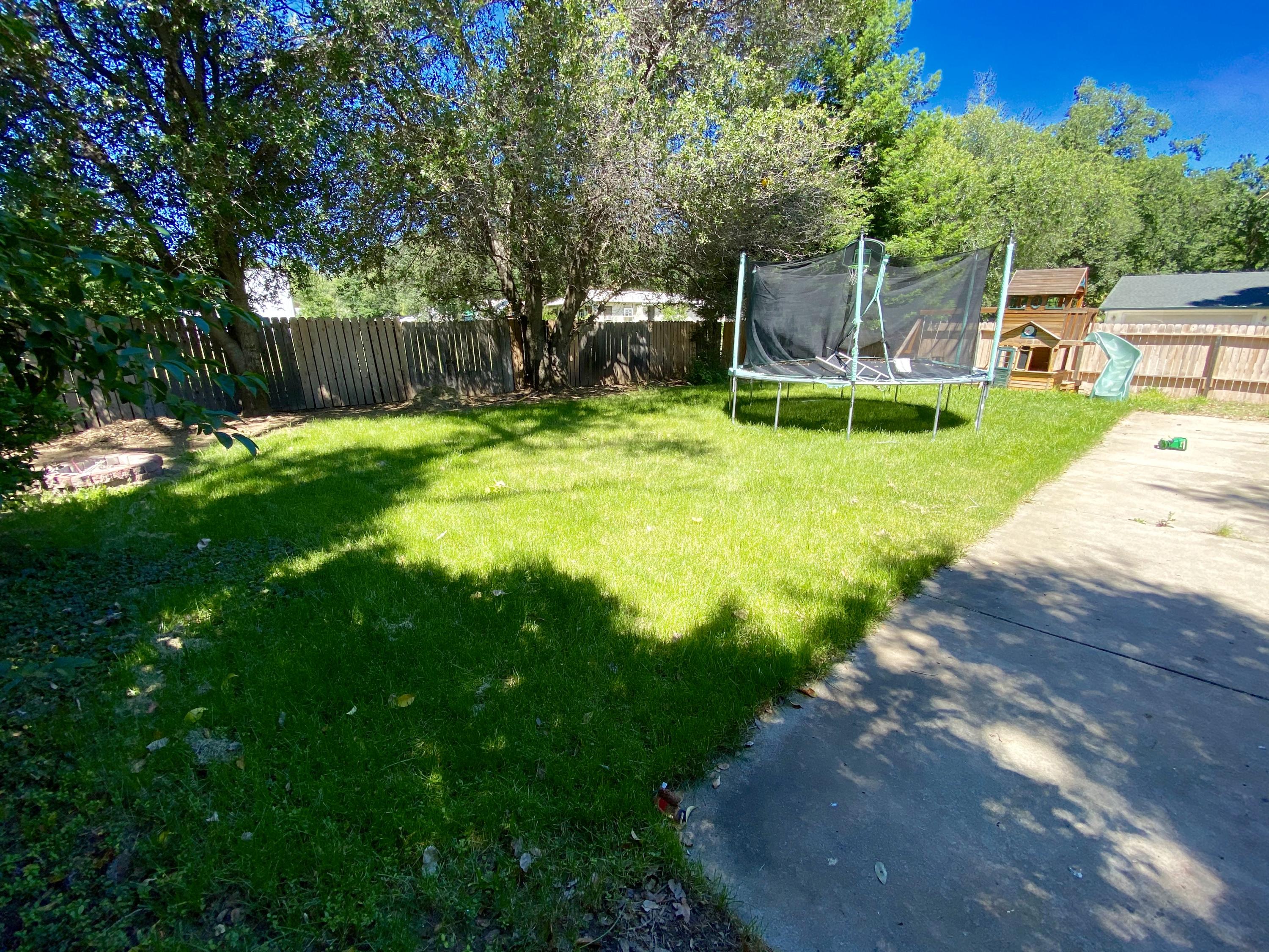 5378 Cedars Road Redding, CA 96001 - Photo 20 of 23 a view of a backyard with a garden